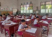 Babinsa Koramil 09/Tiga Balata Monitor Pelaksanaan UAS Di SD Plus Tiga Balata, Pastikan Berjalan Aman Dan Lancar.